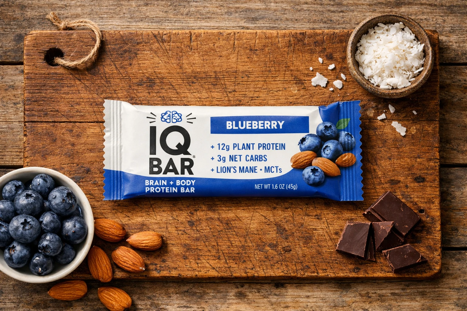 Fresh IQBAR Brain + Body Protein Bar on rustic wooden table - 150 calories per bar