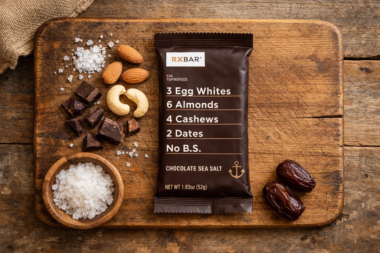 RXBAR chocolate sea salt bar on wooden board - 210 calories per bar