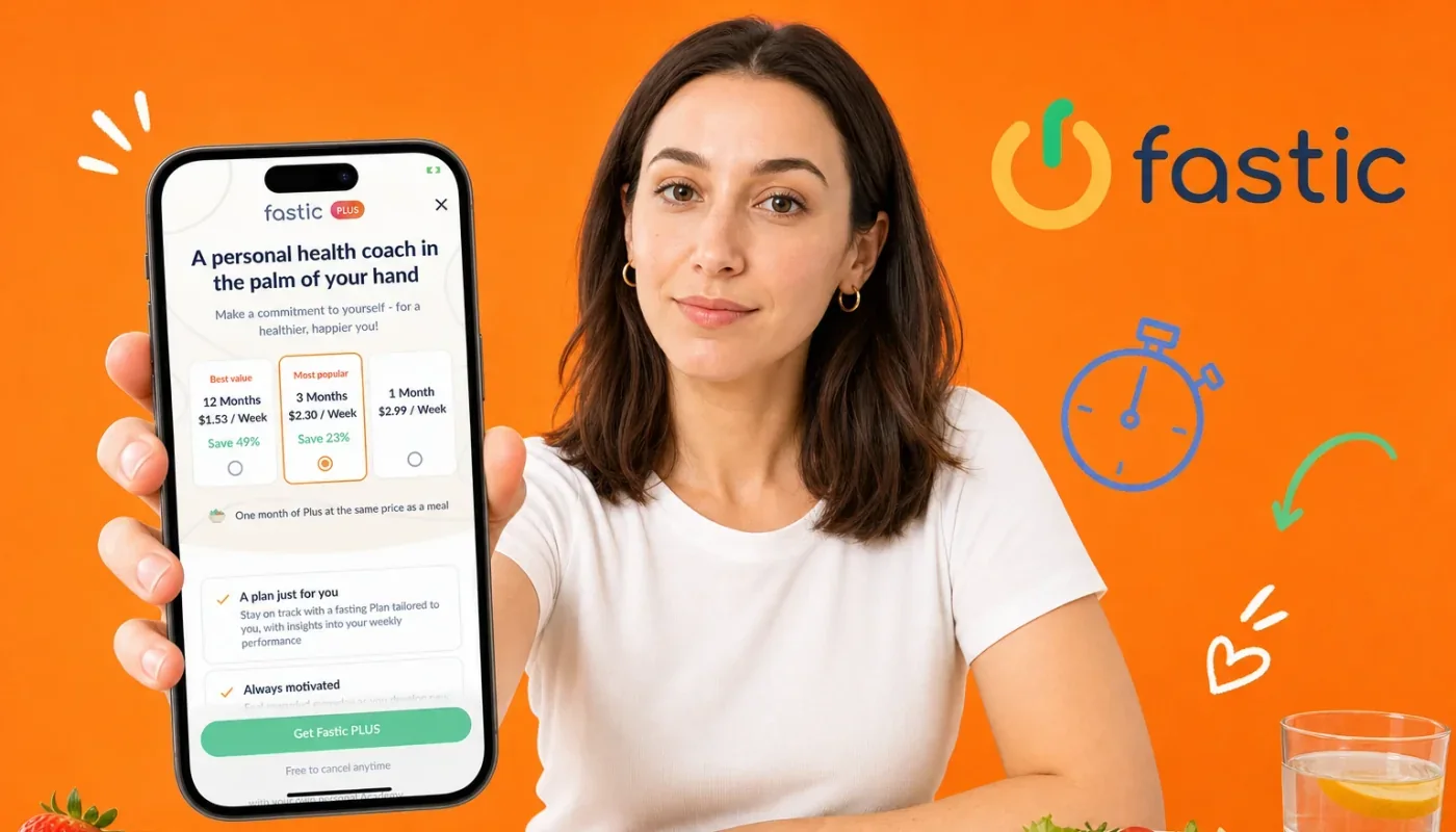 Hand holding a phone with a 16:8 fasting timer and lesson card beside a healthy chicken and vegetable bowl, illustrating the best Fastic alternatives for 2026