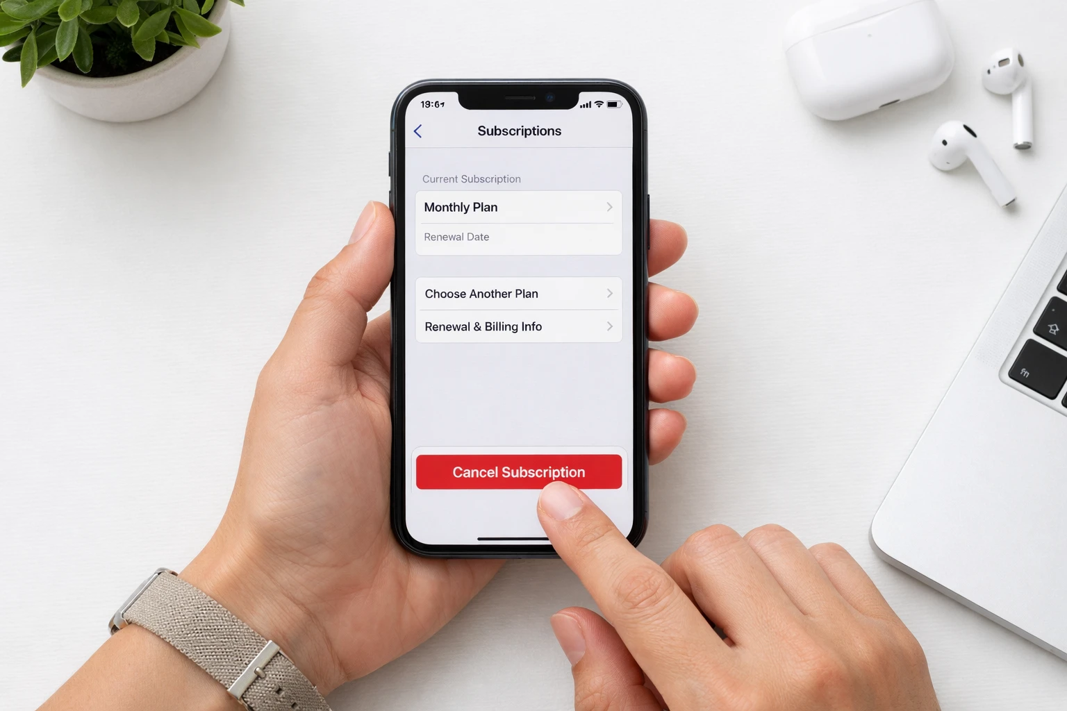 Person holding iPhone showing subscription settings screen for canceling a free trial